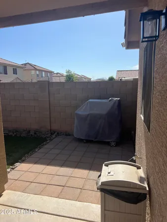 a view of barbeque area with seating