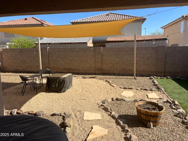 a view of swimming pool with patio