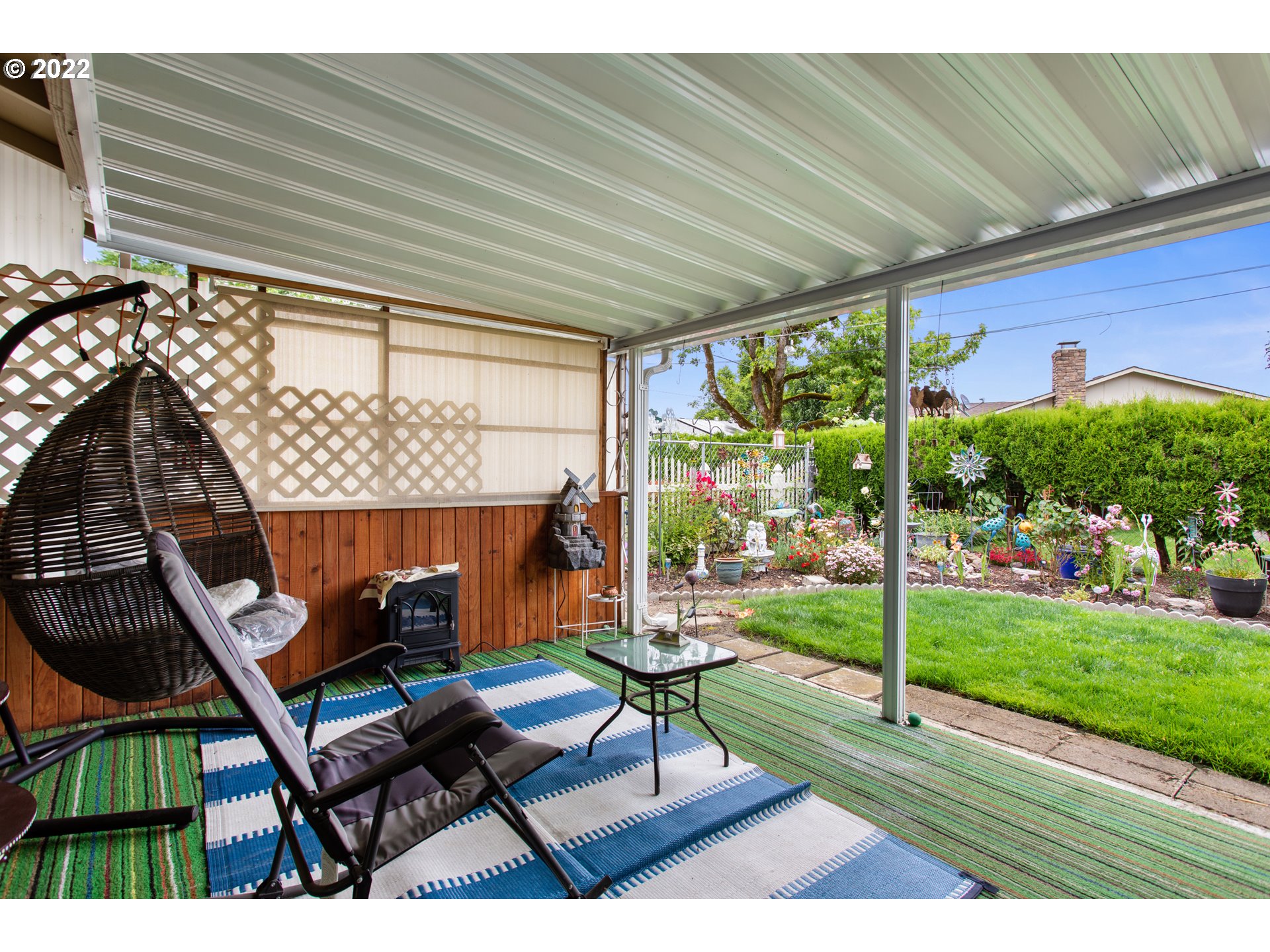 1740 Jansen Way Woodburn, OR 97071 - Photo 15 of 30 a view of a porch with furniture and a yard