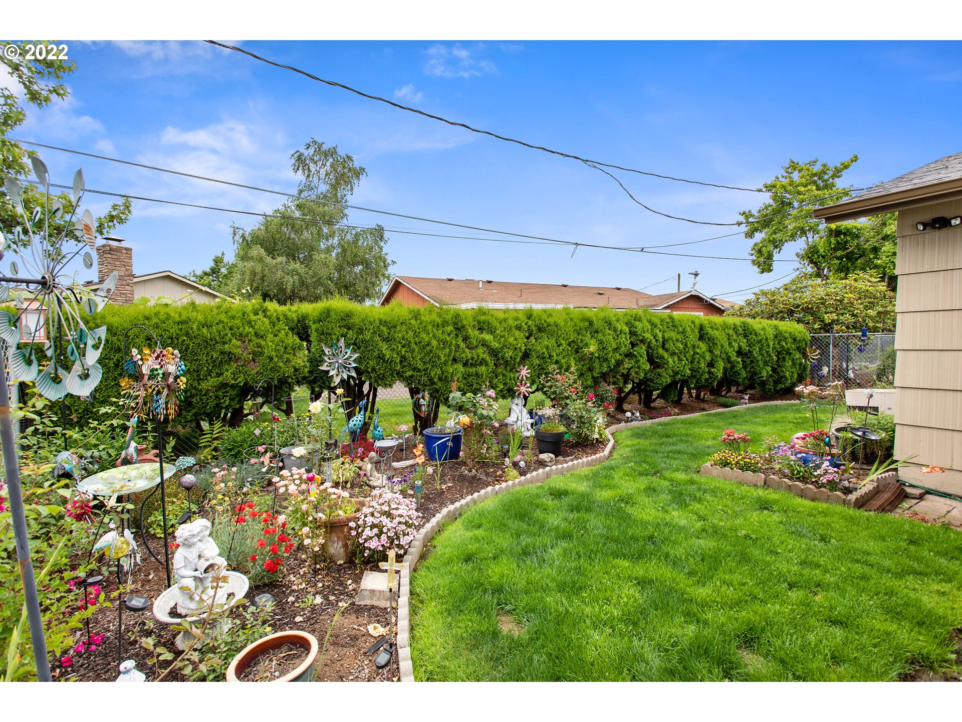 1740 Jansen Way Woodburn, OR 97071 - Photo 18 of 30 a view of a chair and tables in the garden