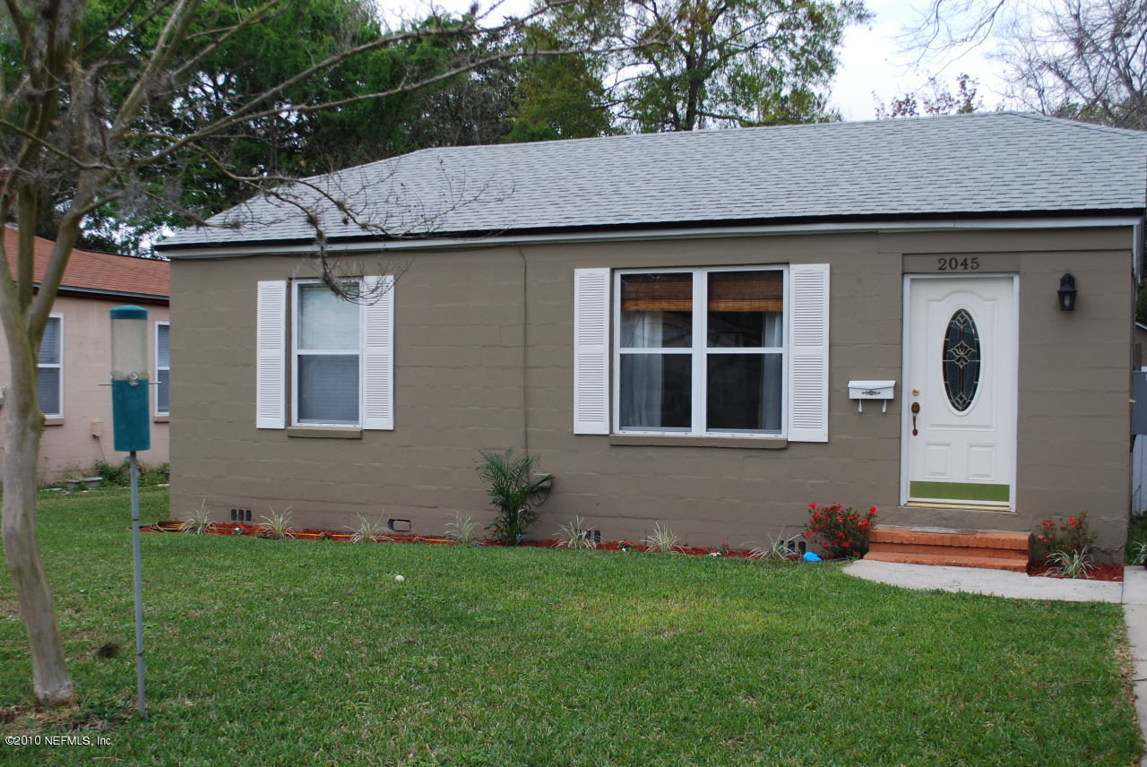 2045 Kingswood Road Jacksonville, FL 32207 - Photo 1 of 22 a aerial view of a house with a yard