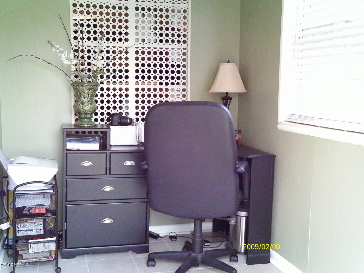 2045 Kingswood Road Jacksonville, FL 32207 - Photo 15 of 22 a room with a table and a mirror