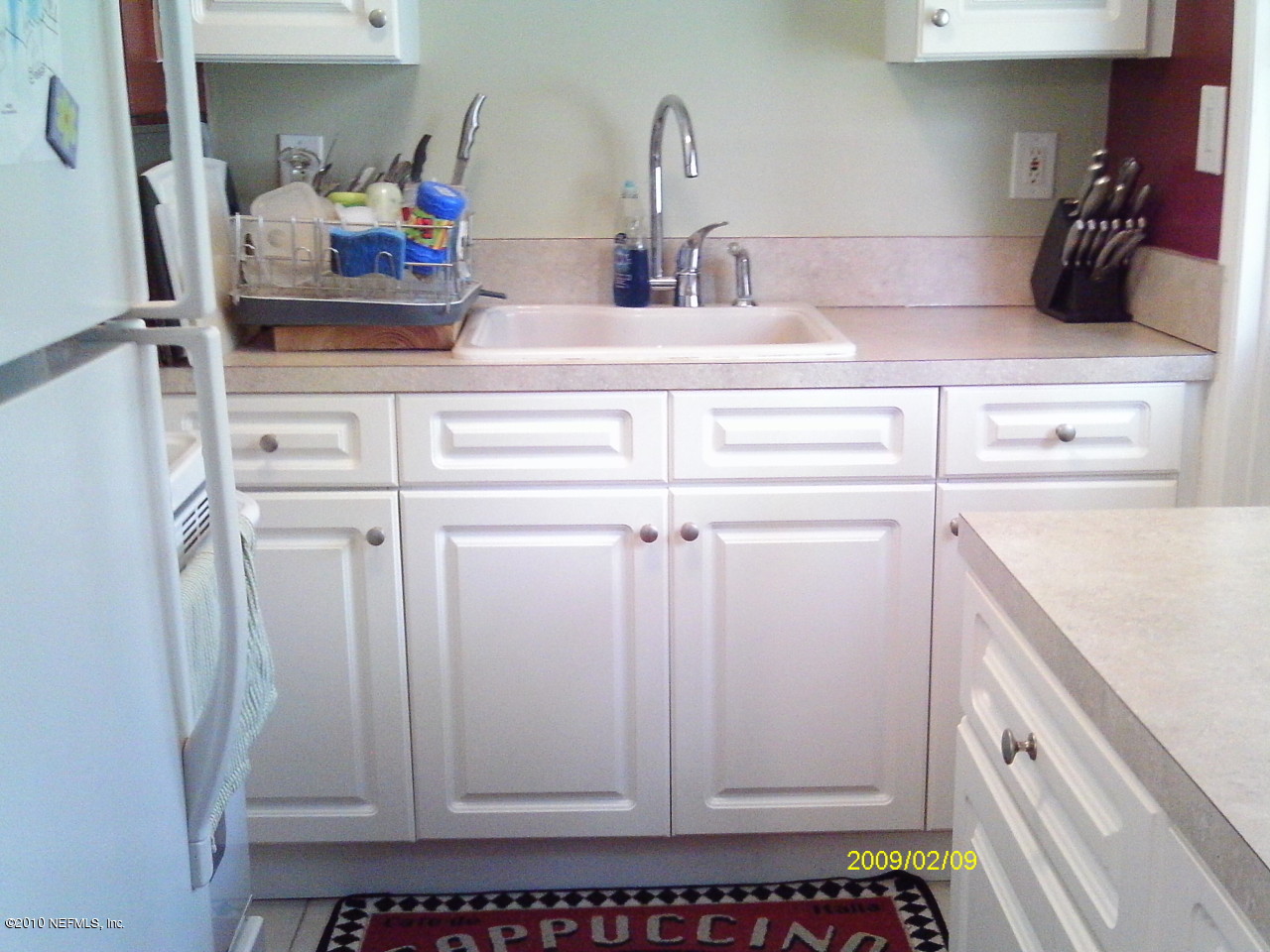 2045 Kingswood Road Jacksonville, FL 32207 - Photo 2 of 22 a bathroom with a sink and vanity