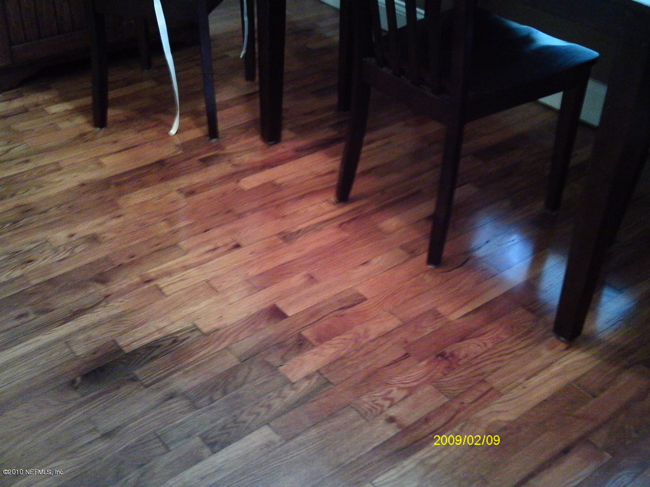 2045 Kingswood Road Jacksonville, FL 32207 - Photo 5 of 22 a view of empty room with wooden floor and fan