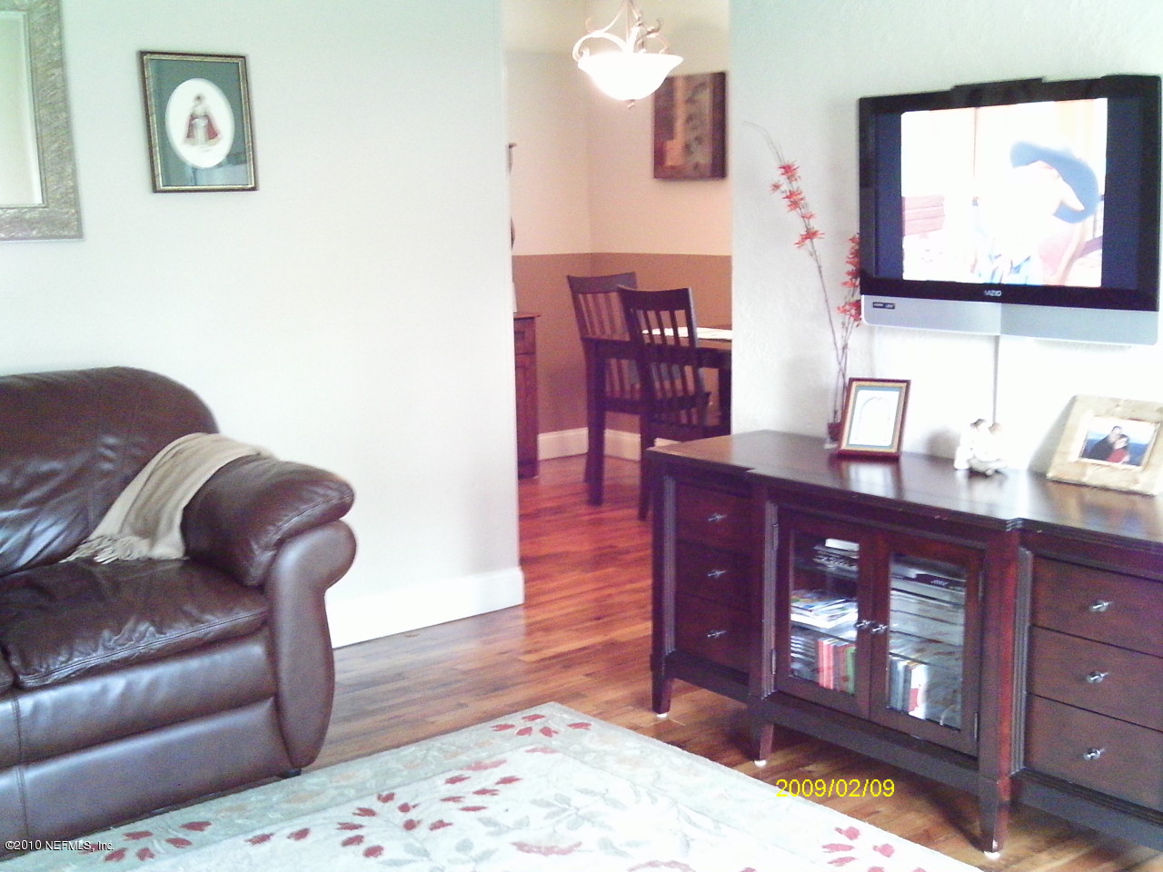 2045 Kingswood Road Jacksonville, FL 32207 - Photo 7 of 22 a living room with furniture and wooden floor