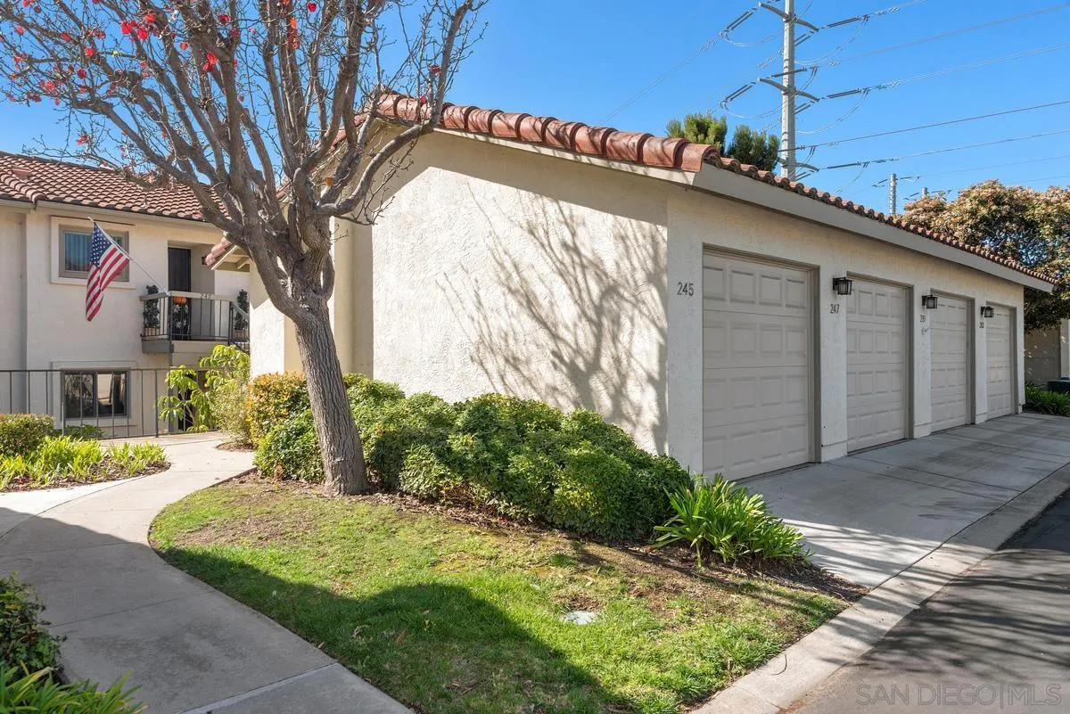 245 Fairlee Lane Encinitas, CA 92024 - Photo 10 of 18 a view of a house with a small yard and potted plants