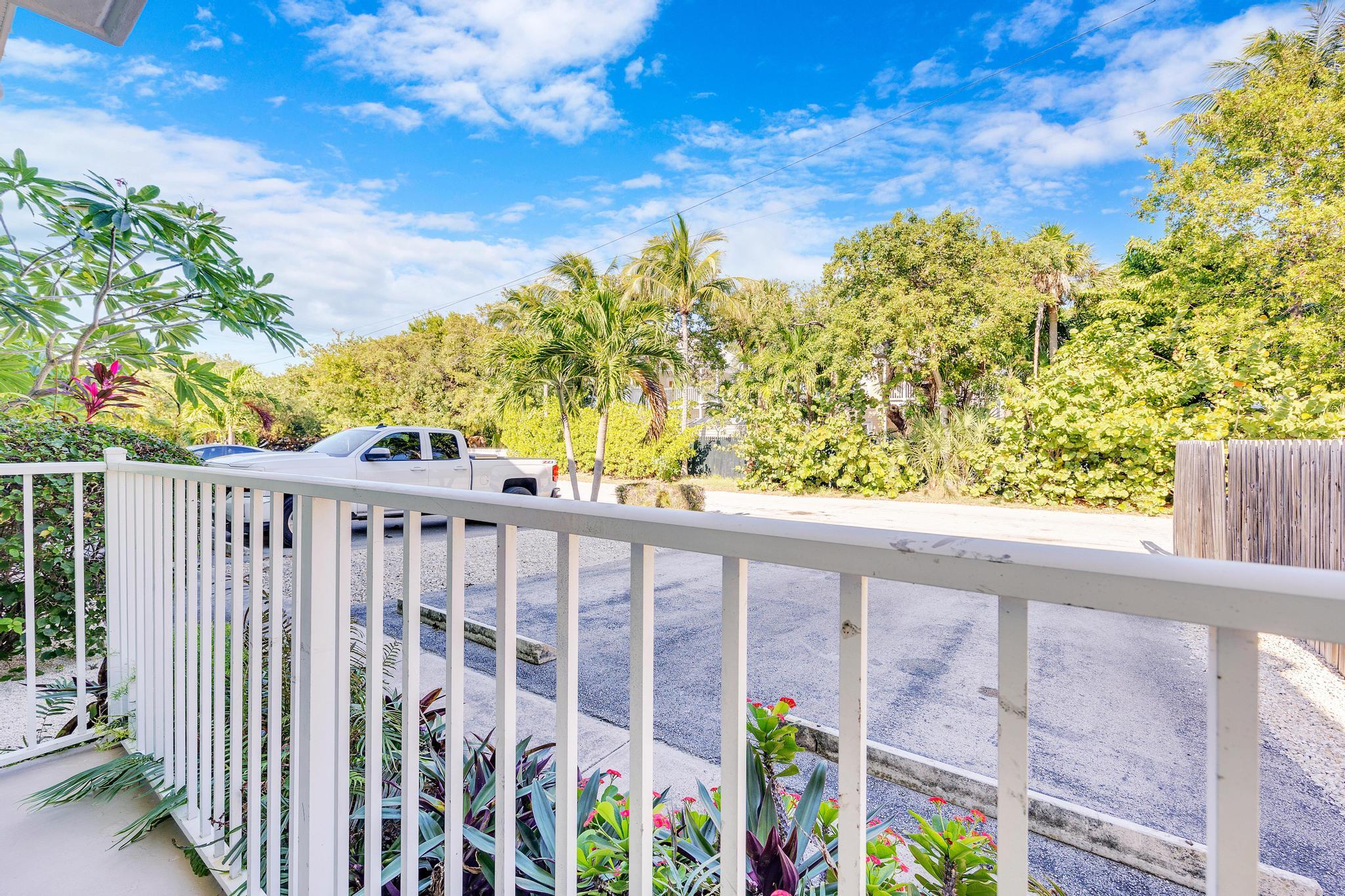 1129 Pebble Beach Lane, Unit 6 Marathon, FL 33050 - Photo 23 of 32 a view of a wooden fence
