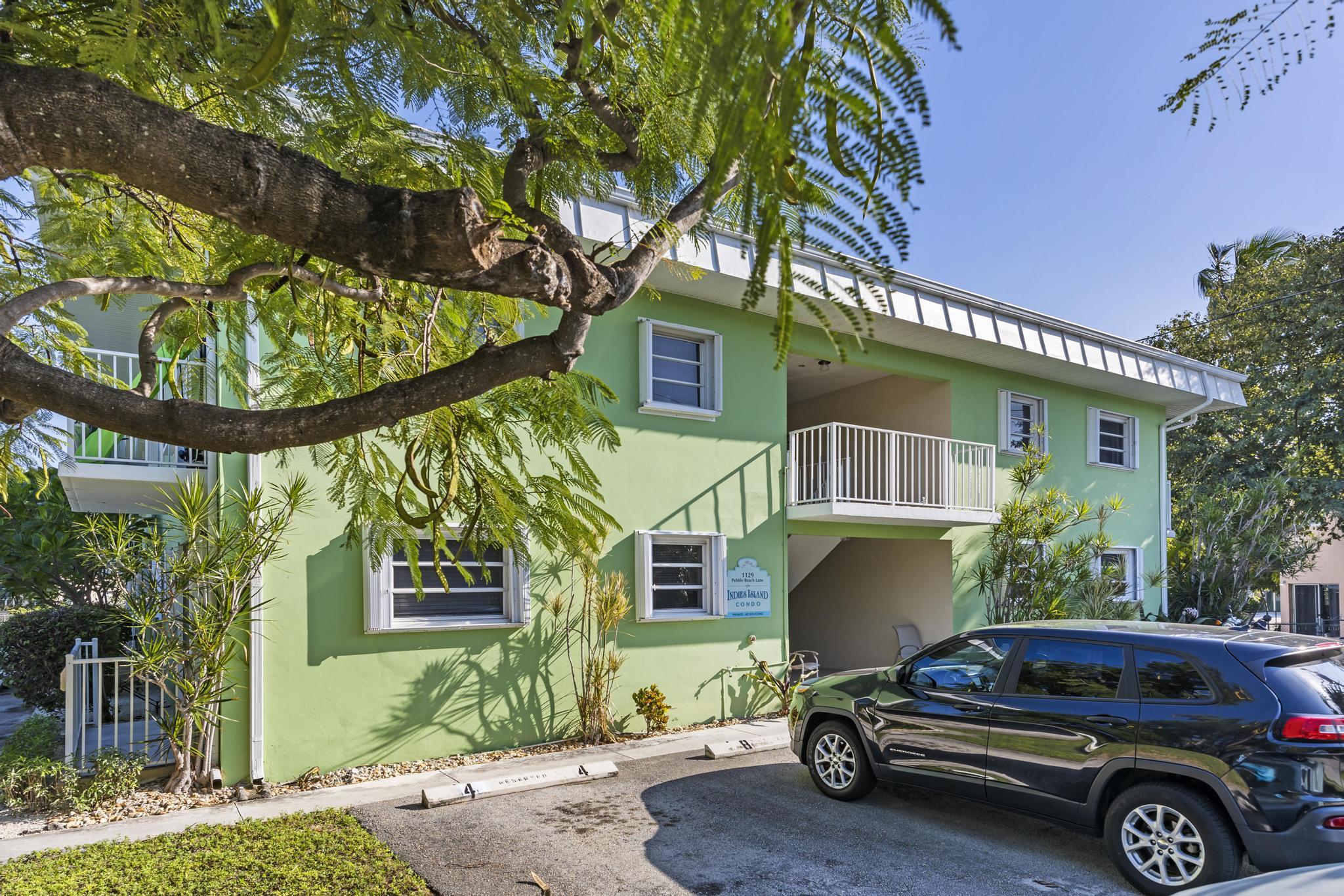 1129 Pebble Beach Lane, Unit 6 Marathon, FL 33050 - Photo 24 of 32 a car parked in front of a house