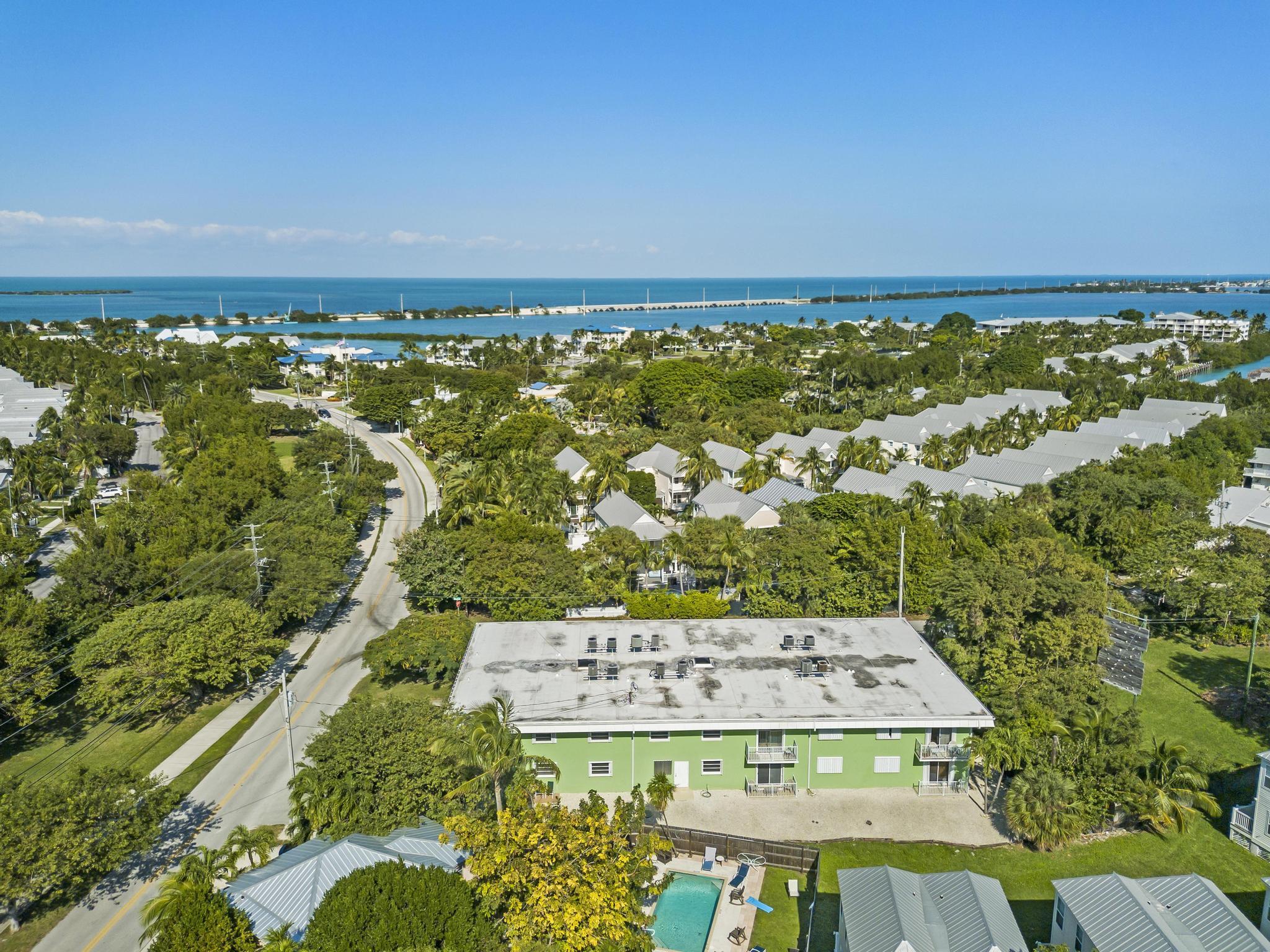 1129 Pebble Beach Lane, Unit 6 Marathon, FL 33050 - Photo 25 of 32 an aerial view of a house with a yard