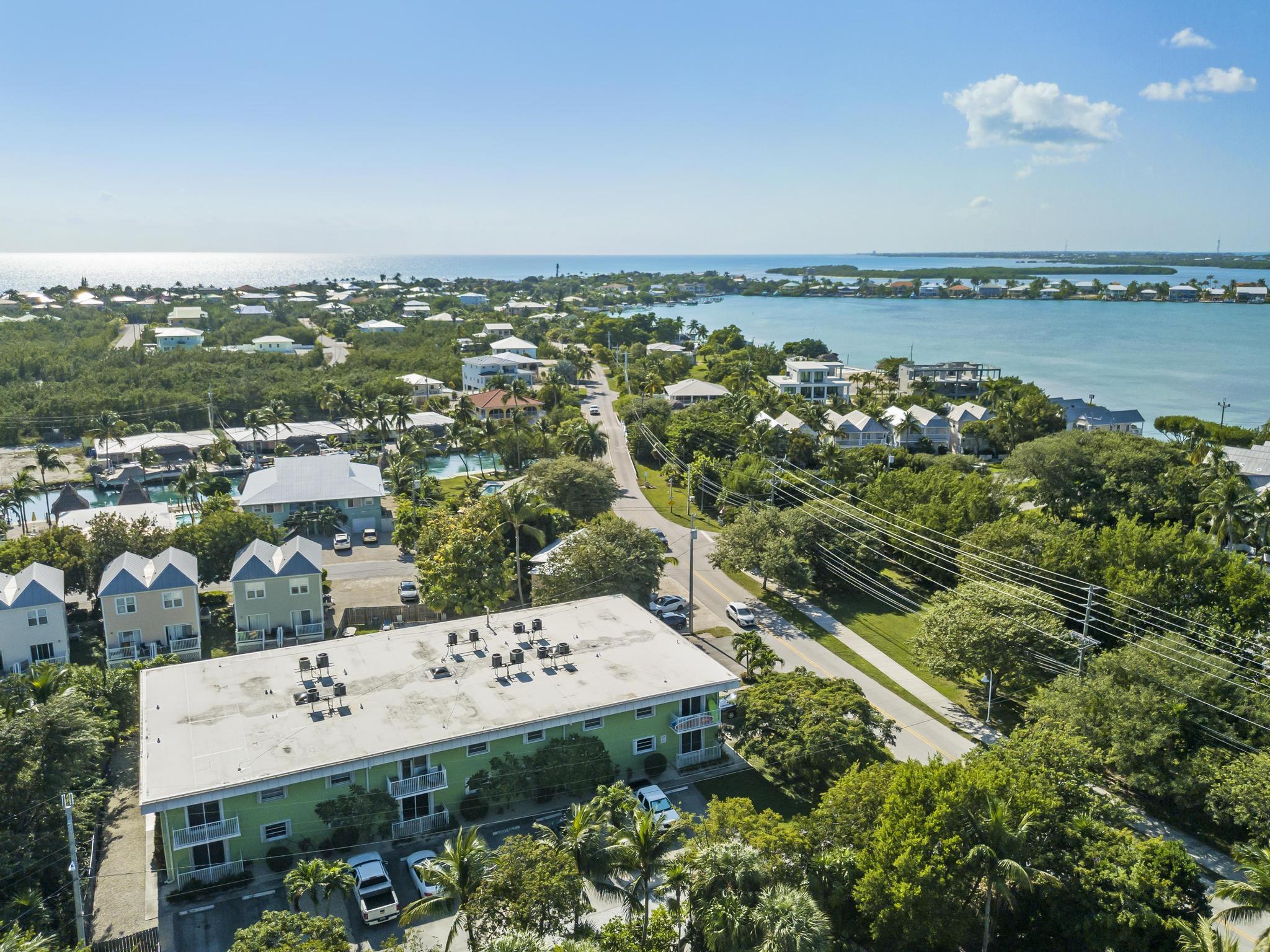 1129 Pebble Beach Lane, Unit 6 Marathon, FL 33050 - Photo 27 of 32 an aerial view of a house with a garden