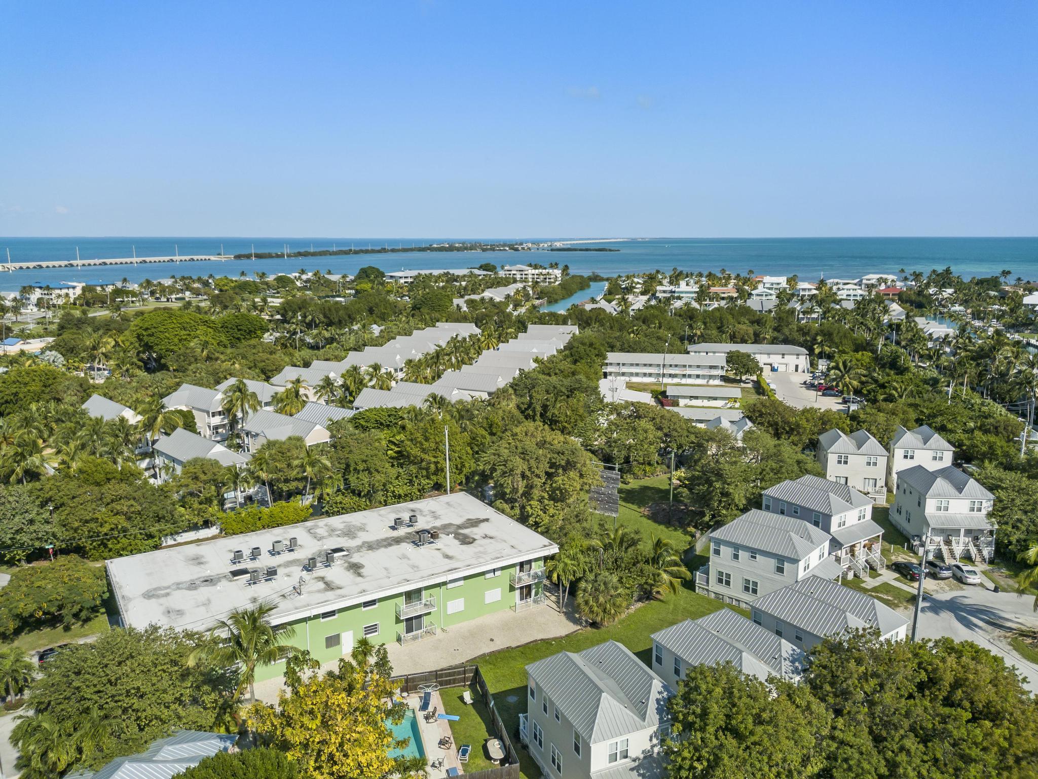 1129 Pebble Beach Lane, Unit 6 Marathon, FL 33050 - Photo 31 of 32 an aerial view of a house with a lake view