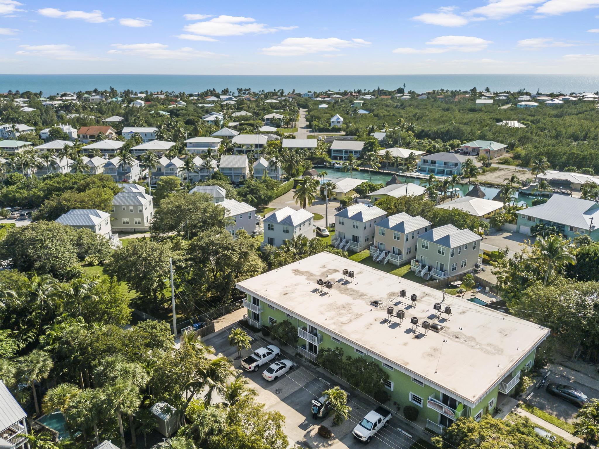1129 Pebble Beach Lane, Unit 6 Marathon, FL 33050 - Photo 32 of 32 an aerial view of a residential houses with city view