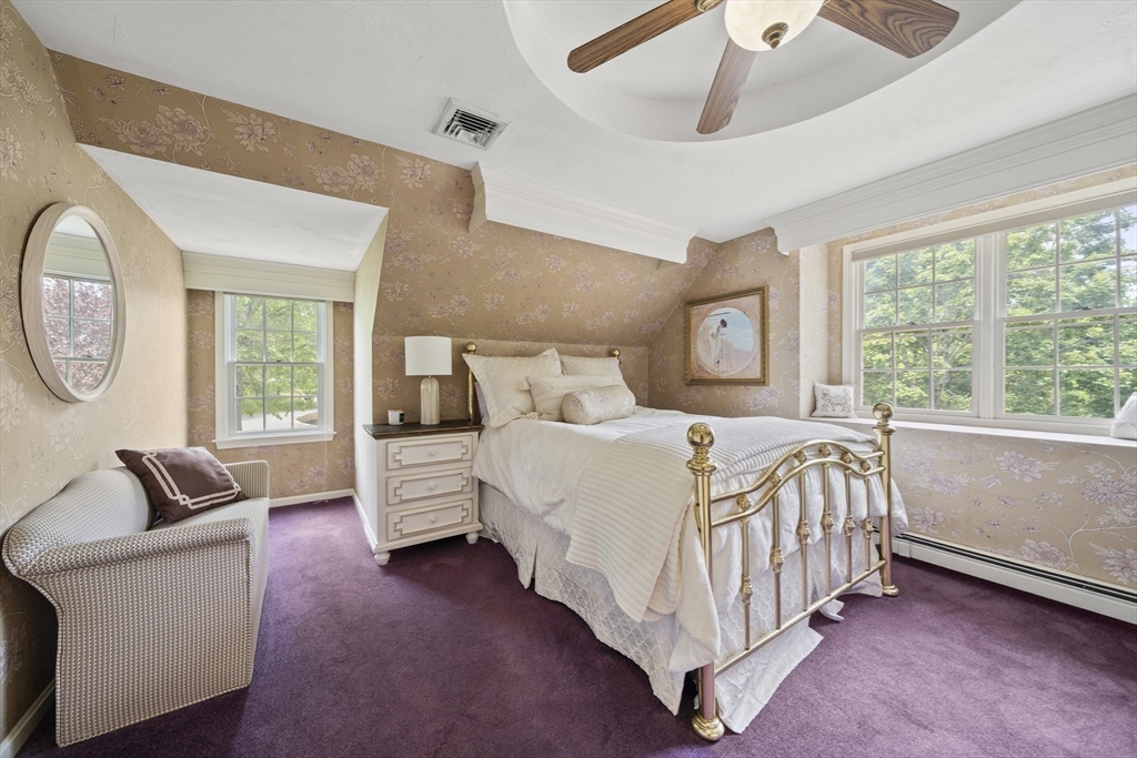30 Franklin Rodgers Road Hingham, MA 02043 - Photo 23 of 37 a bed room with a bed and a couch