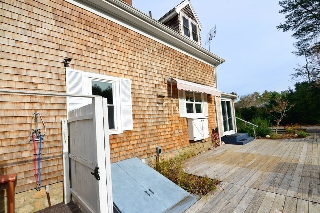 108 Marion Road Rochester, MA 02770 - Photo 30 of 38 a view of a house with backyard and sitting area
