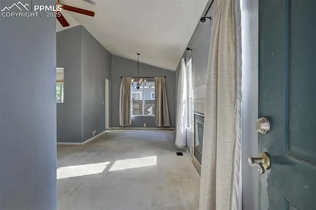 an empty room with windows