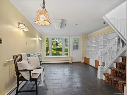 a view of livingroom with furniture and window