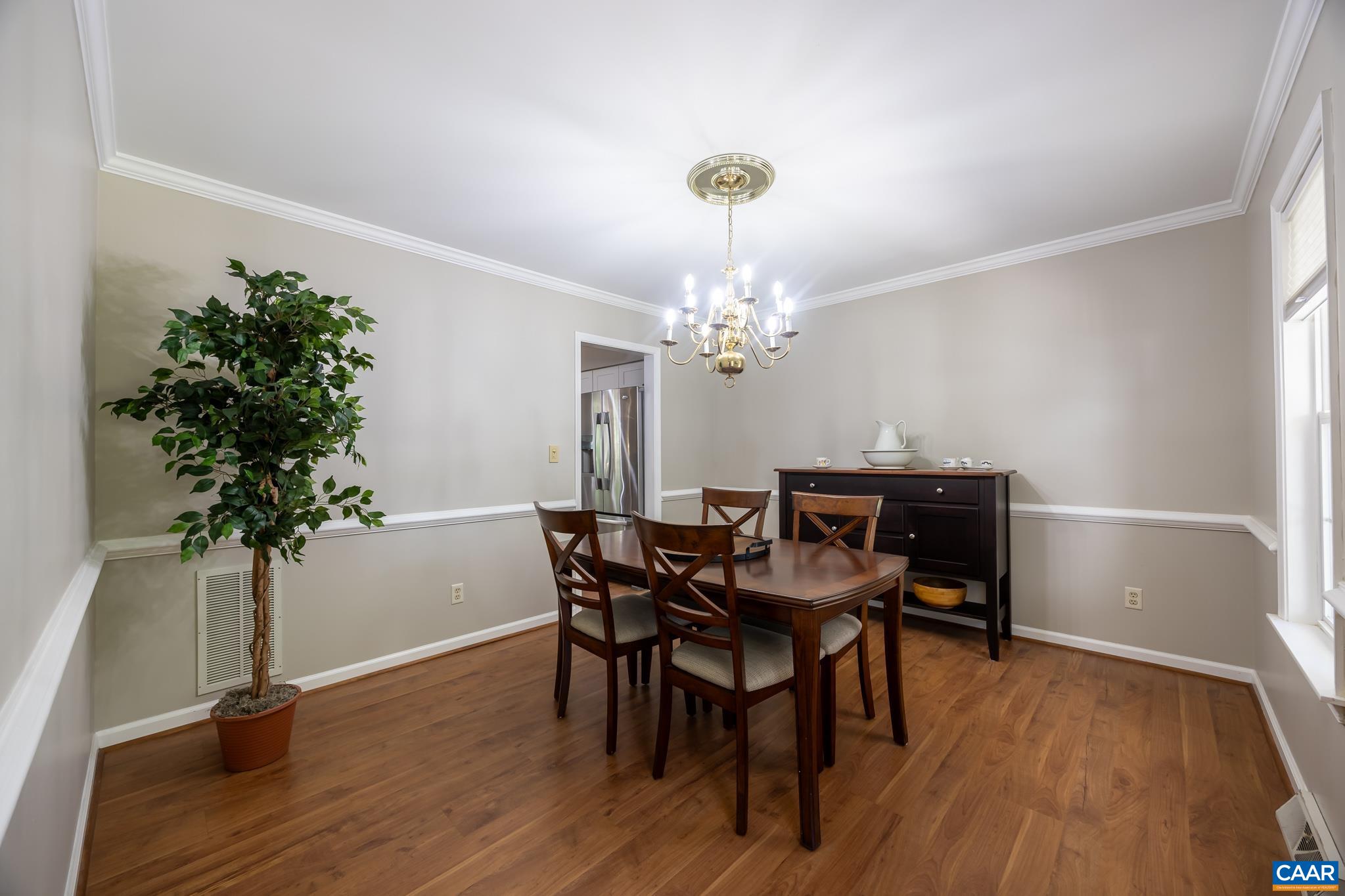 3221 Poplar Ridge Road Charlottesville, VA 22911 - Photo 11 of 72 a view of a dining room with furniture and wooden floor
