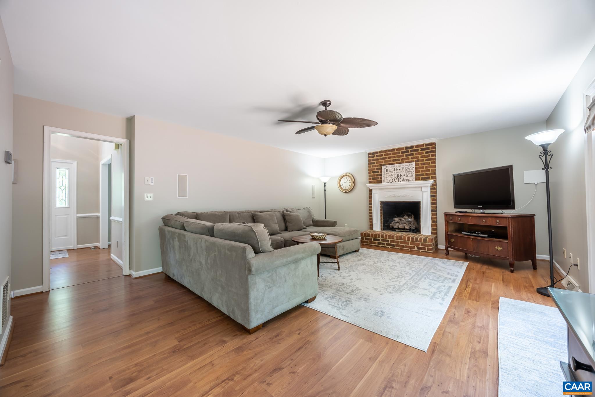 3221 Poplar Ridge Road Charlottesville, VA 22911 - Photo 14 of 72 a living room with furniture and a flat screen tv