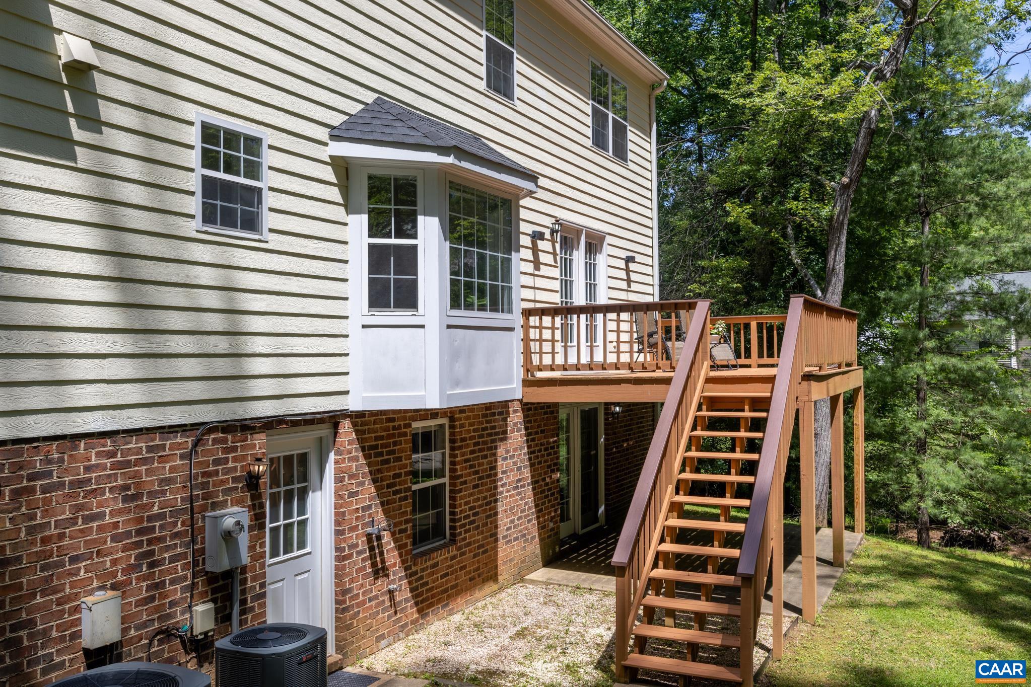 3221 Poplar Ridge Road Charlottesville, VA 22911 - Photo 59 of 72 a front view of a house with balcony