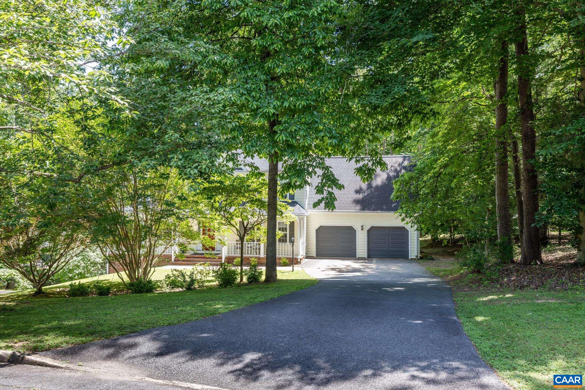 3221 Poplar Ridge Road Charlottesville, VA 22911 - Photo 62 of 72 a front view of a house with garden