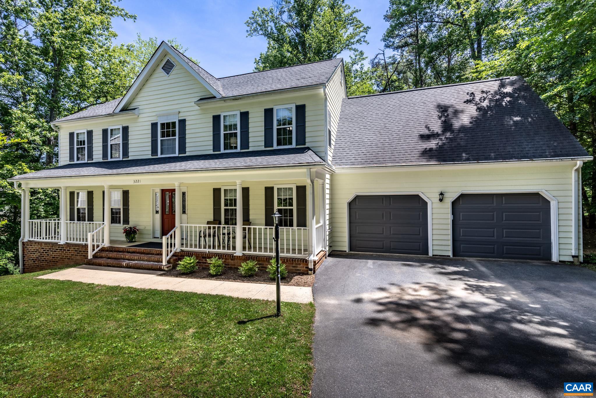 3221 Poplar Ridge Road Charlottesville, VA 22911 - Photo 63 of 72 a view of a house with a yard and a large tree