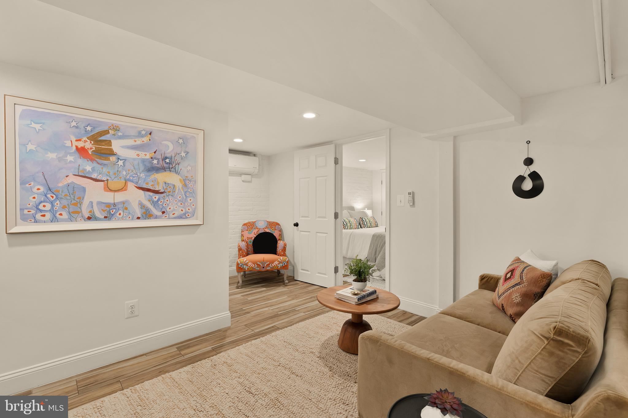 222 Tennessee Avenue Northeast Washington, DC 20002 - Photo 18 of 29 a living room with furniture and a couch