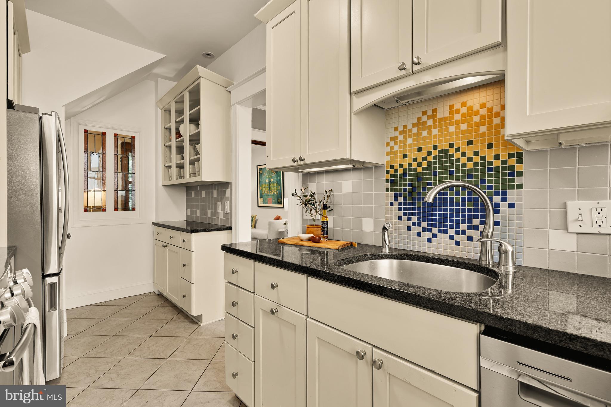 222 Tennessee Avenue Northeast Washington, DC 20002 - Photo 9 of 29 a kitchen with sink and cabinets