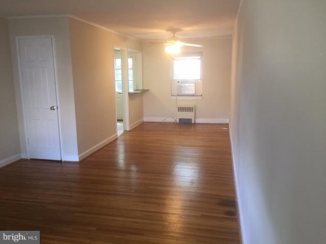 2808 16th Road South, Unit 2808B Arlington, VA 22204 - Photo 2 of 15 a view of a room with wooden floor and a window