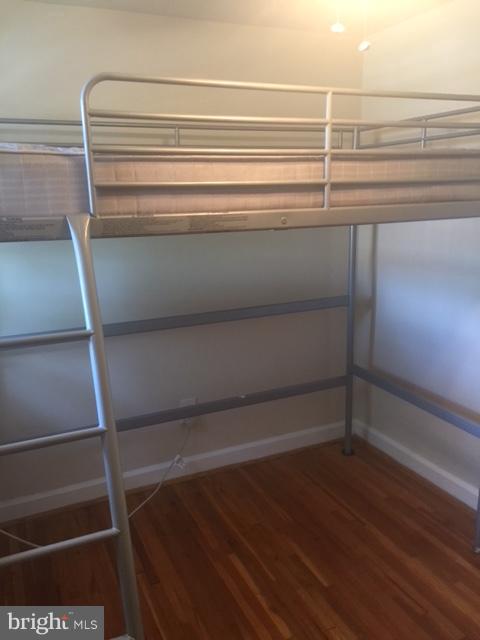 2808 16th Road South, Unit 2808B Arlington, VA 22204 - Photo 14 of 15 a view of walk in closet with empty racks