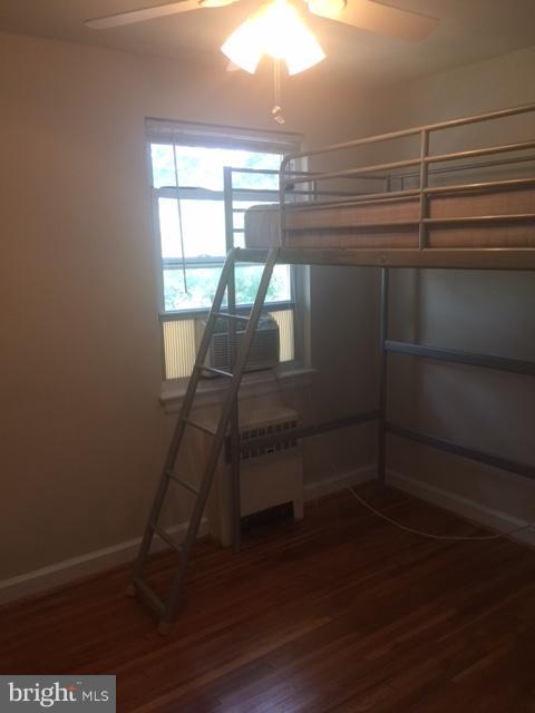 2808 16th Road South, Unit 2808B Arlington, VA 22204 - Photo 15 of 15 a room with wooden floor and windows