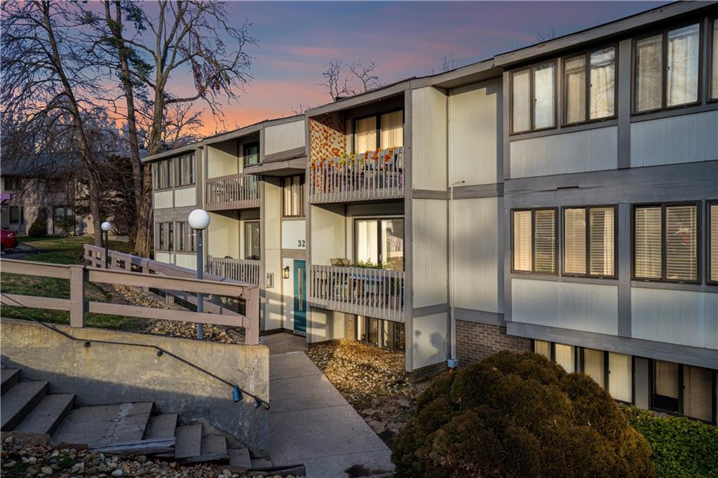 321 Ridge Point Circle, Unit 33B Bridgeville, PA 15017 - Photo 2 of 25 a front view of a building with glass windows