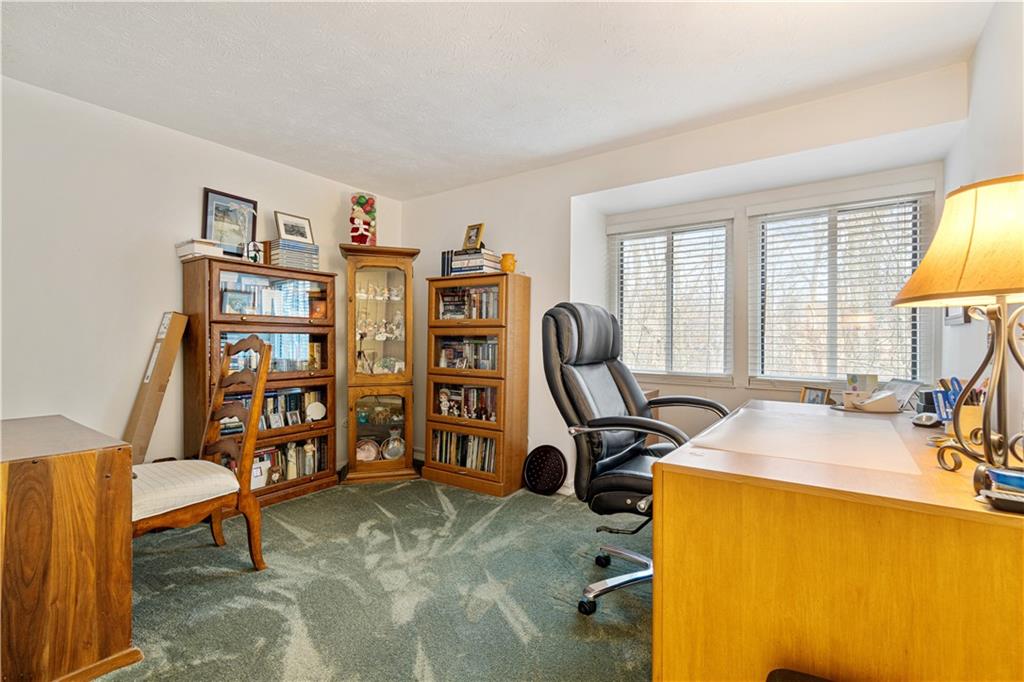 321 Ridge Point Circle, Unit 33B Bridgeville, PA 15017 - Photo 21 of 25 a view of a workspace with furniture and a window