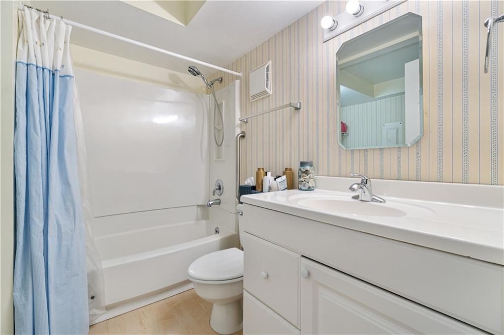 321 Ridge Point Circle, Unit 33B Bridgeville, PA 15017 - Photo 22 of 25 a bathroom with a sink toilet and shower