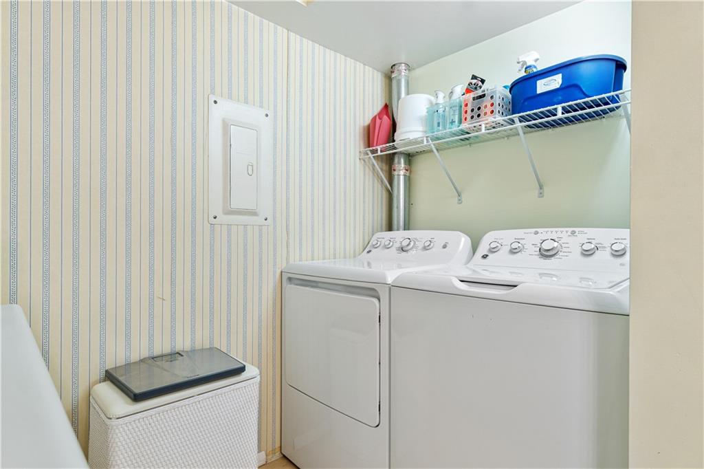 321 Ridge Point Circle, Unit 33B Bridgeville, PA 15017 - Photo 23 of 25 a utility room with dryer and washer