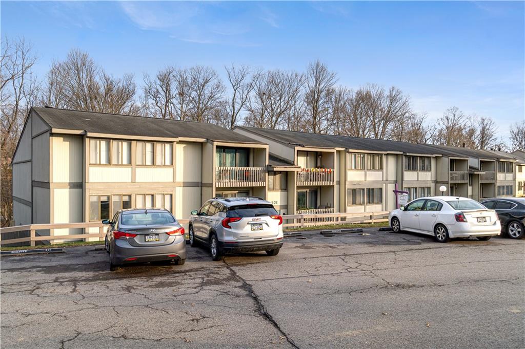 321 Ridge Point Circle, Unit 33B Bridgeville, PA 15017 - Photo 5 of 25 a car parked in front of a house