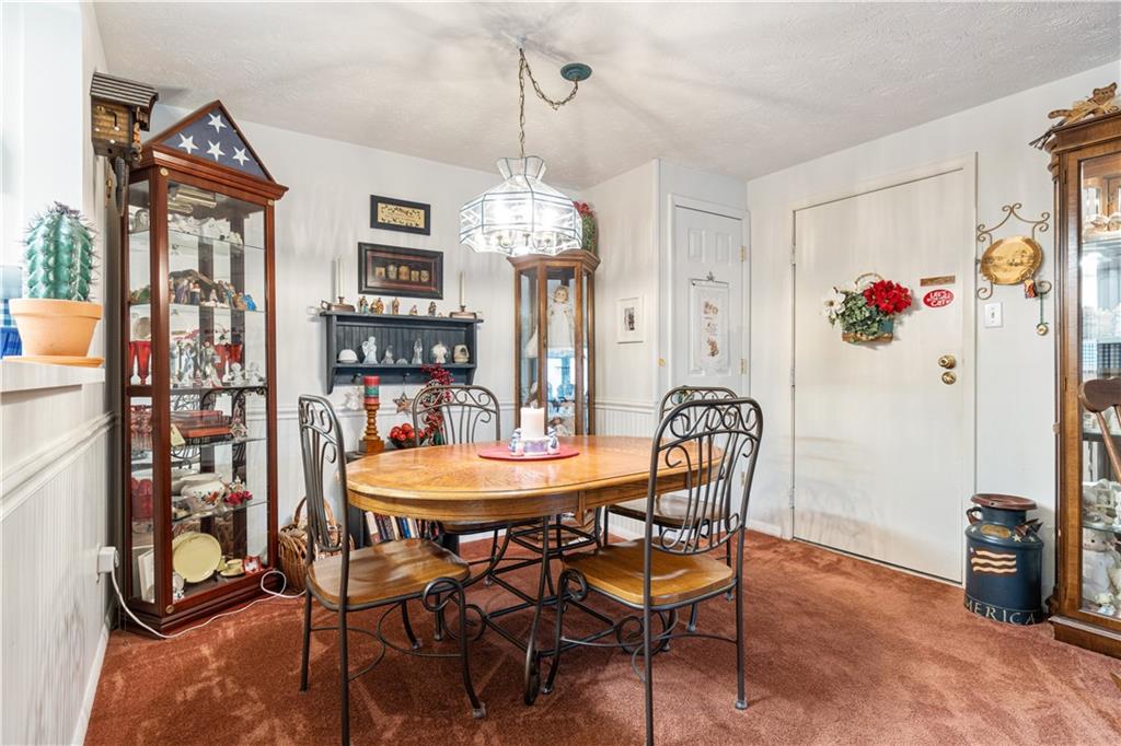 321 Ridge Point Circle, Unit 33B Bridgeville, PA 15017 - Photo 9 of 25 a dining room with furniture and window