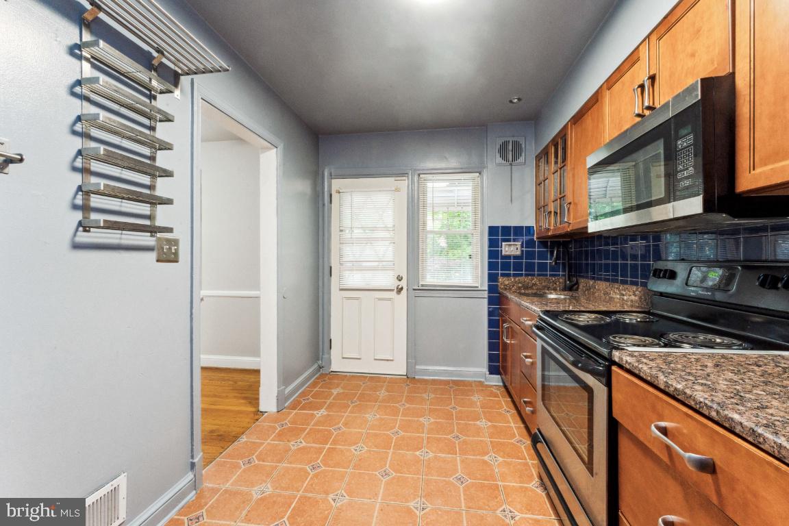 4122 24th Avenue Temple Hills, MD 20748 - Photo 12 of 24 Kitchen leading to back door