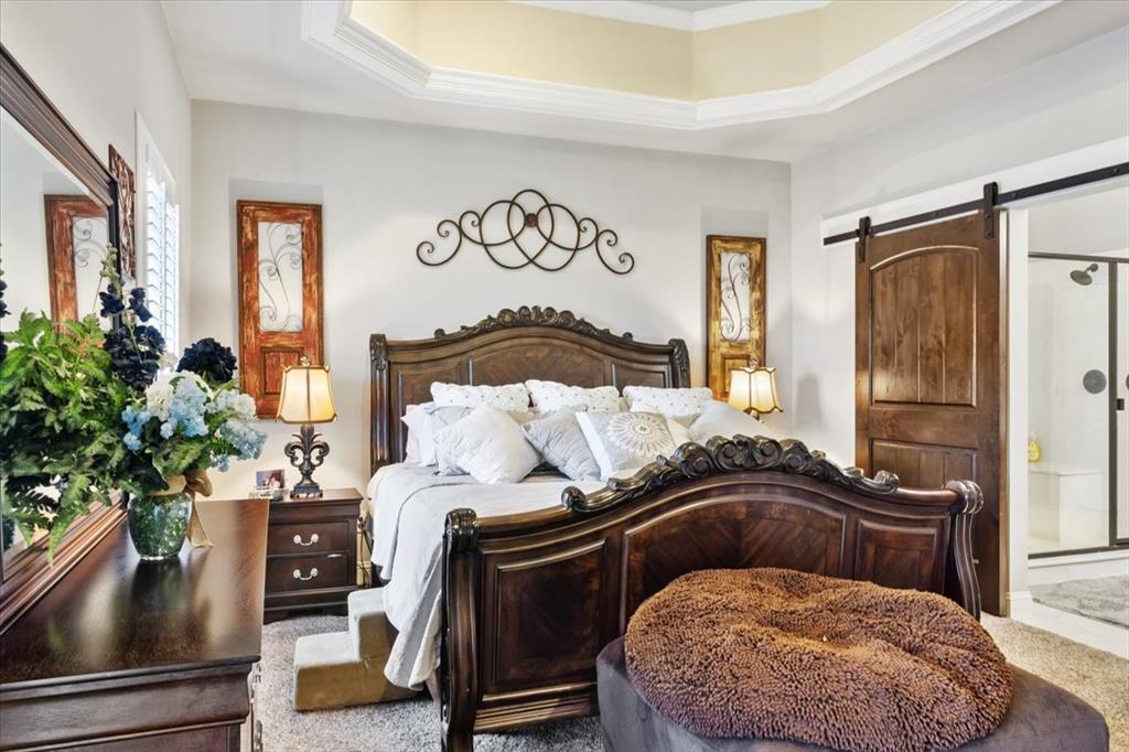 2170 Derrs Chapel Road Italy, TX 76651 - Photo 15 of 38 a bedroom with a large bed and a potted plant