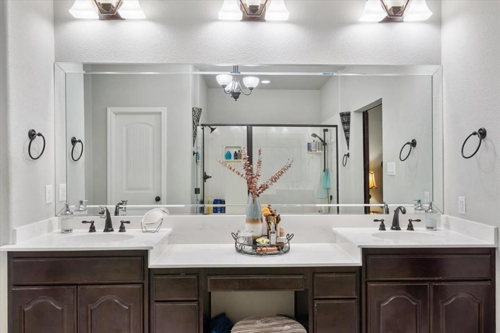 2170 Derrs Chapel Road Italy, TX 76651 - Photo 17 of 38 a bathroom with a sink and a mirror