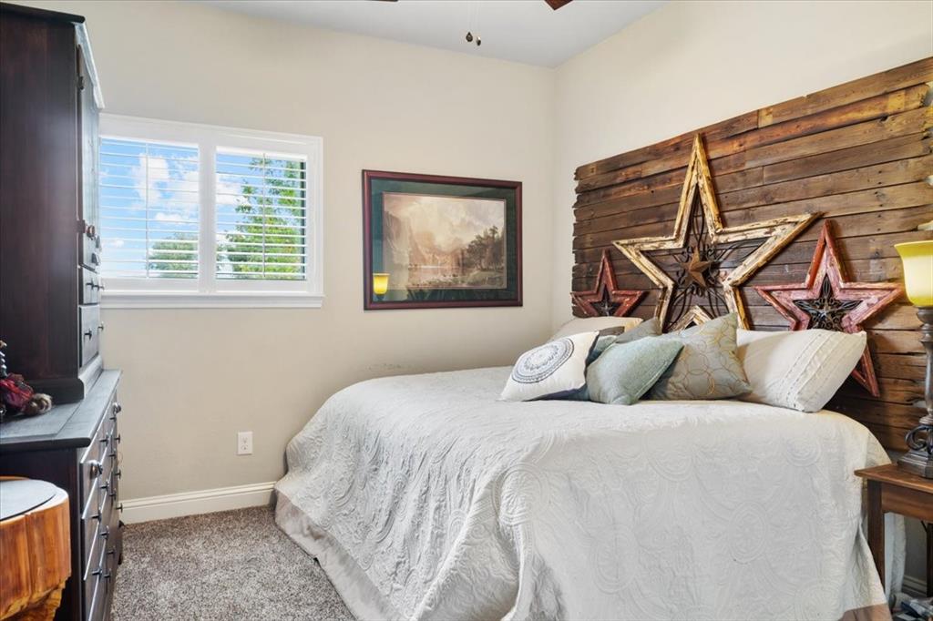 2170 Derrs Chapel Road Italy, TX 76651 - Photo 19 of 38 a bedroom with a bed and a window