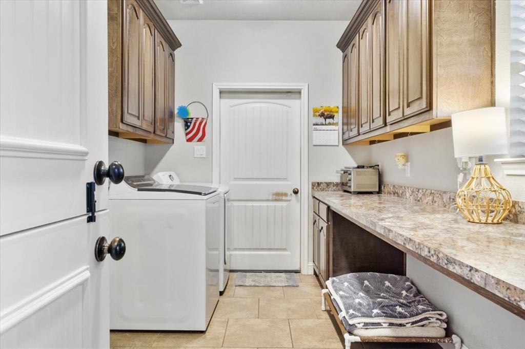 2170 Derrs Chapel Road Italy, TX 76651 - Photo 23 of 38 a kitchen with a sink and a refrigerator