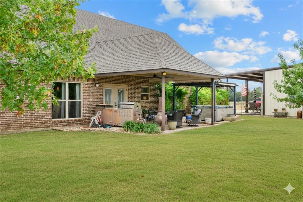 2170 Derrs Chapel Road Italy, TX 76651 - Photo 32 of 38 a view of a house with backyard porch and sitting area