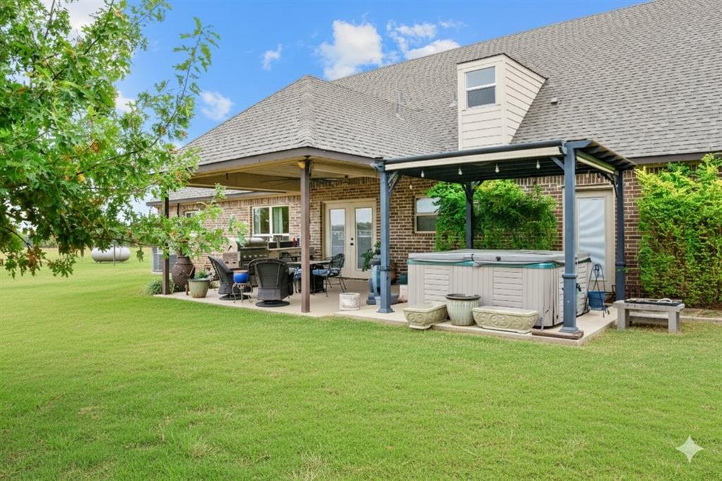 2170 Derrs Chapel Road Italy, TX 76651 - Photo 33 of 38 a view of a house with backyard porch and sitting area