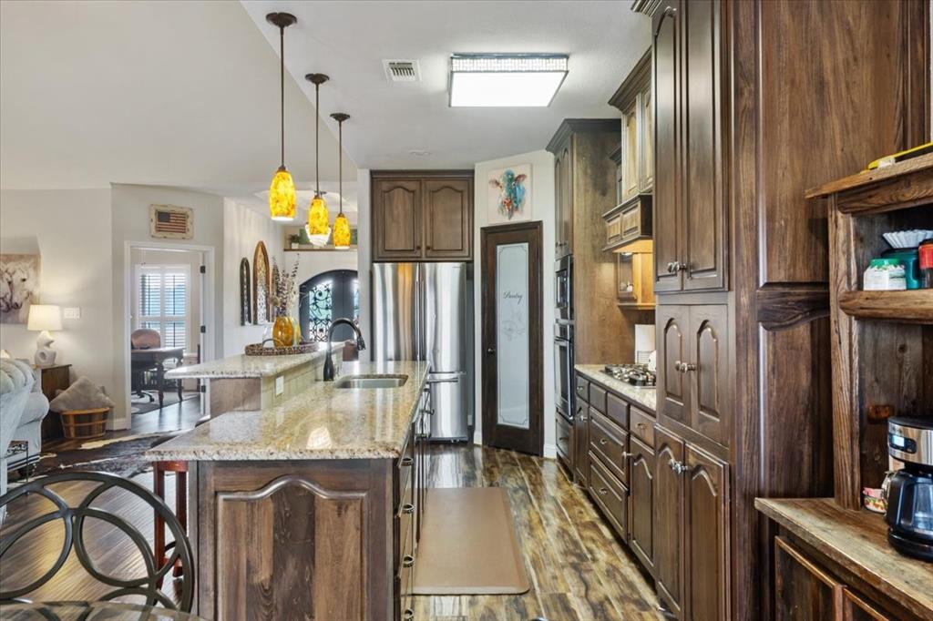 2170 Derrs Chapel Road Italy, TX 76651 - Photo 9 of 38 a very nice looking room with a large window and chandelier