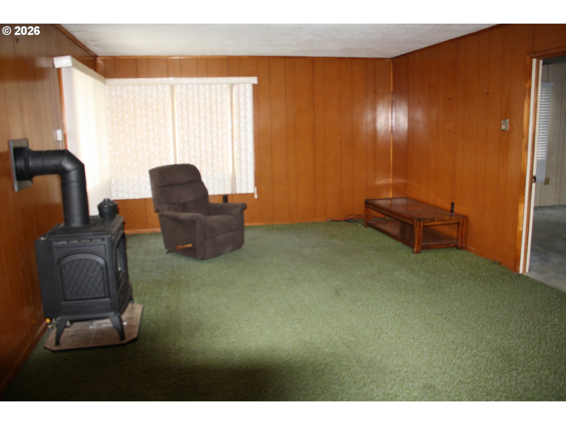 882 Northeast Rifle Range Street Roseburg, OR 97470 - Photo 4 of 16 a living room with furniture and a window