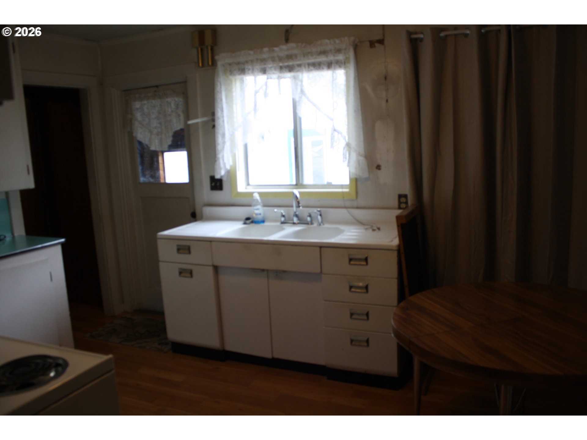 882 Northeast Rifle Range Street Roseburg, OR 97470 - Photo 9 of 16 a bathroom with a granite countertop sink toilet and mirror