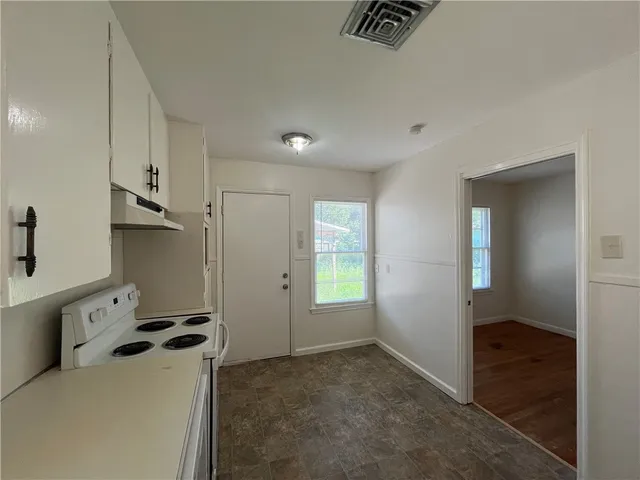 a view of a utility room with closet