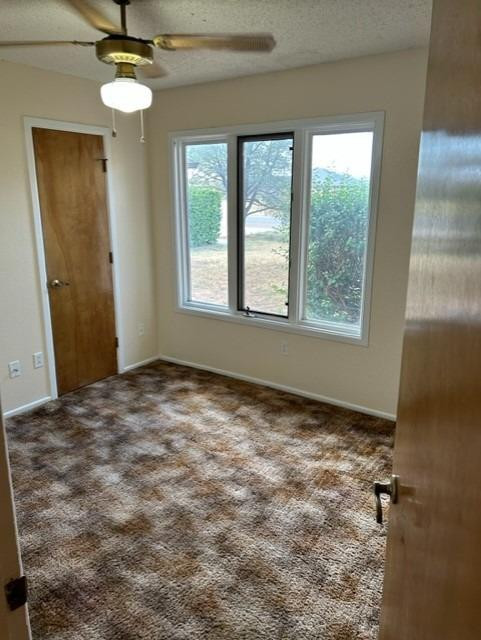 1113 80th Street, Unit B Lubbock, TX 79423 - Photo 11 of 14 a view of an empty room with a window
