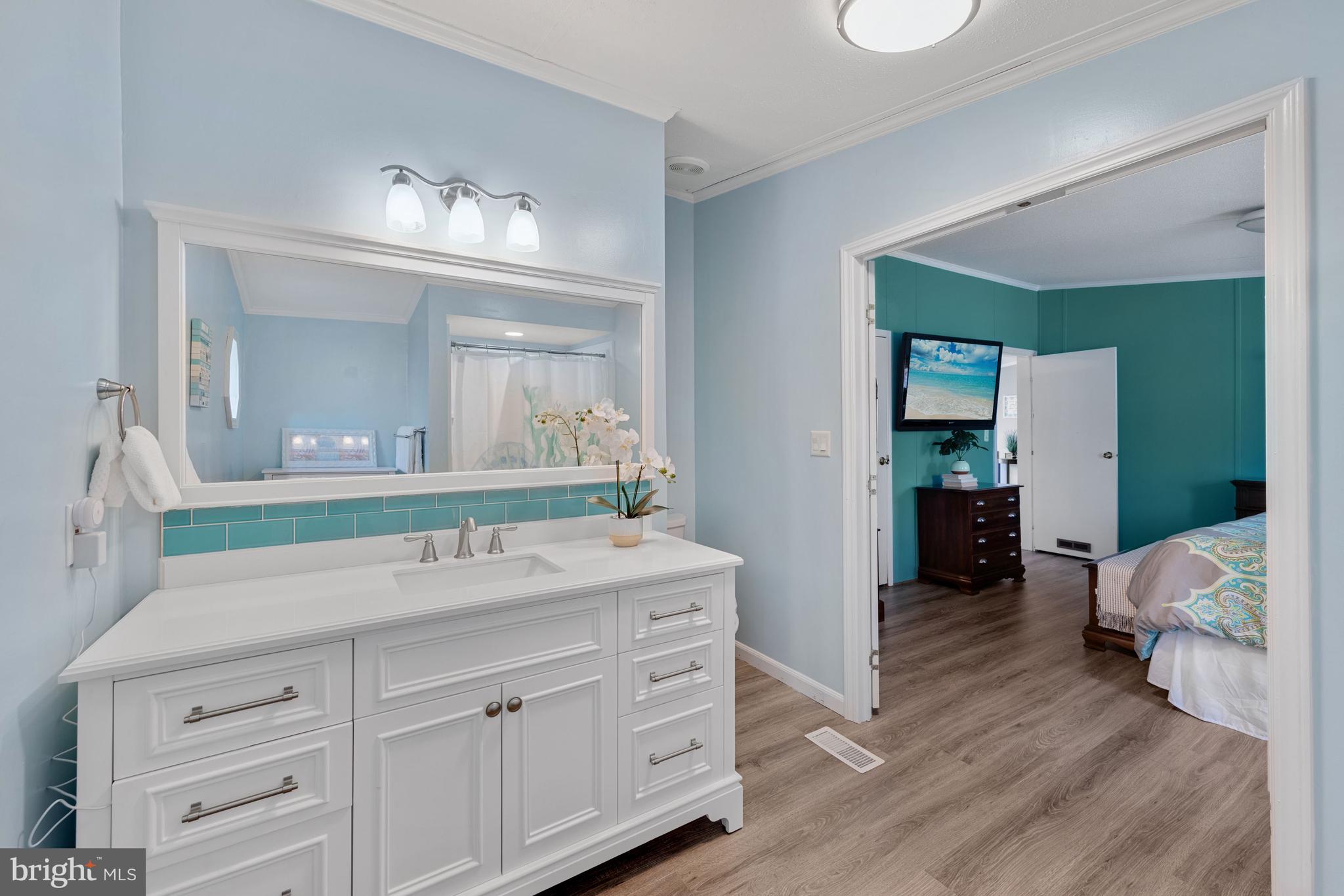 27111 Schooner Road, Unit 49341 Millsboro, DE 19966 - Photo 19 of 45 Primary Bedroom Ensuite