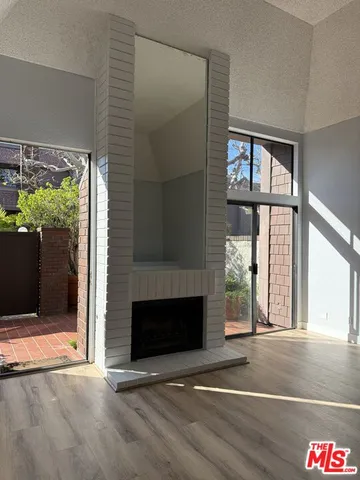 a view of an entryway with a fireplace